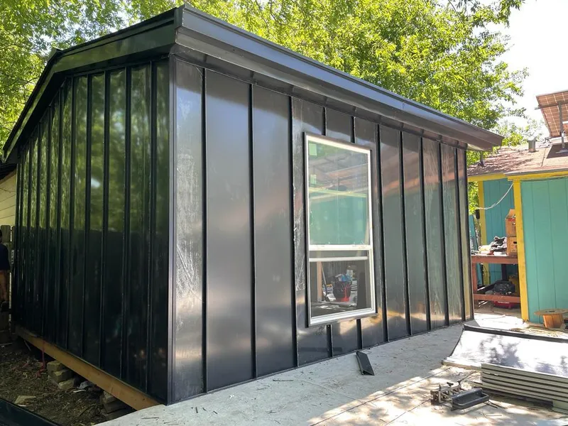 Black standing seam metal wall panels for Metal Roof Installation in Layton