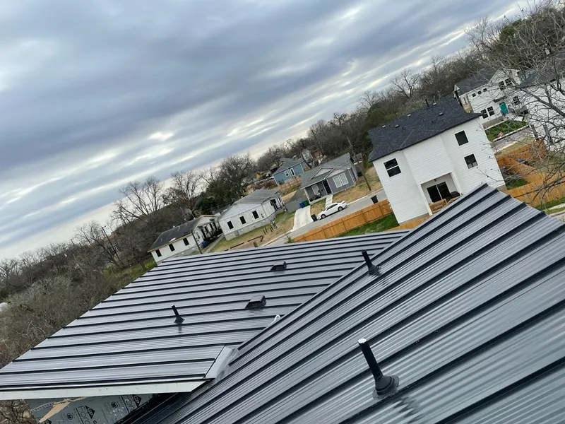 Standing seam metal roof panels with vents for Skylight Repair in Layton